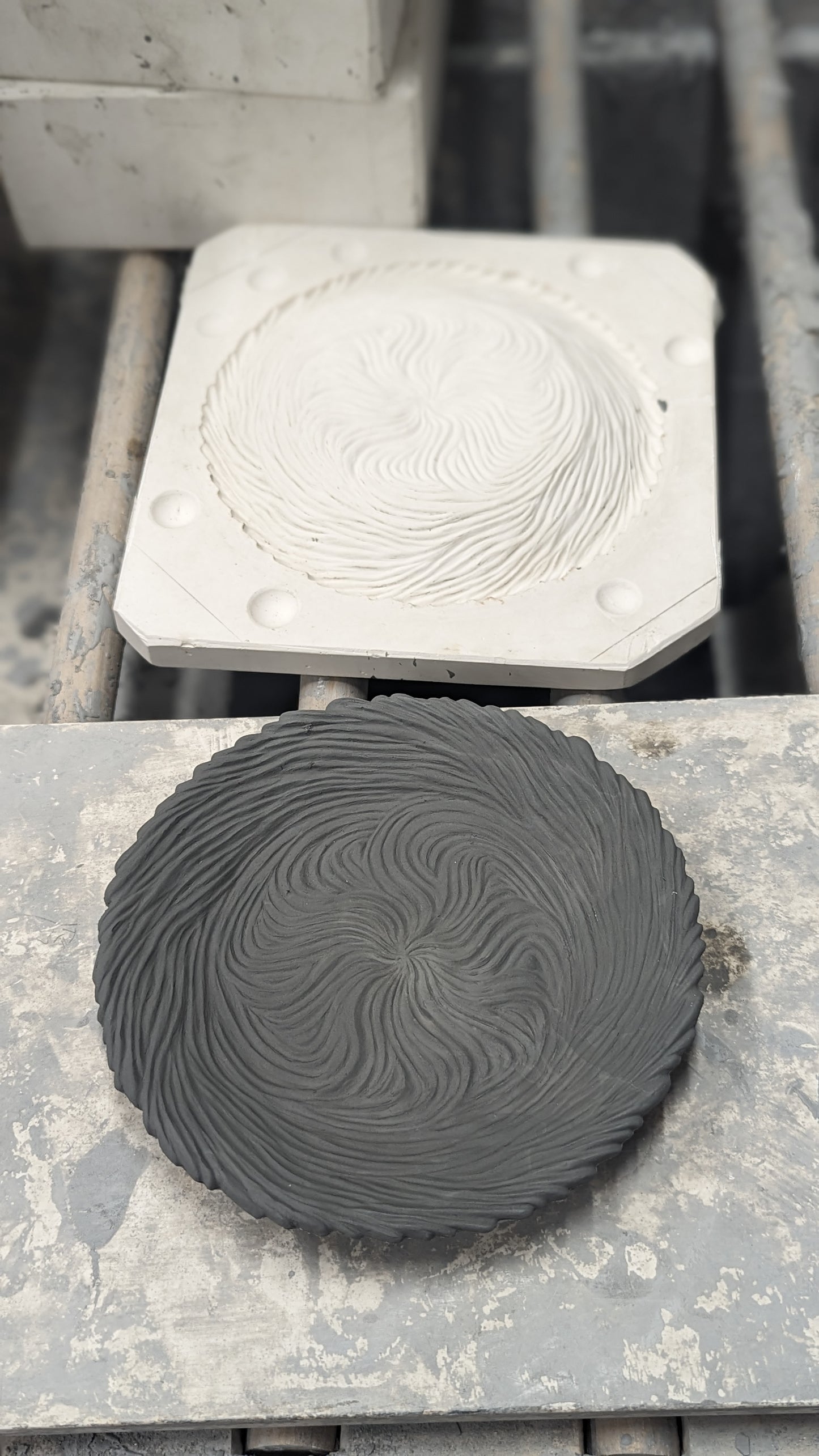 A Portal Plate casting freshly removed from its' handmade plaster mold